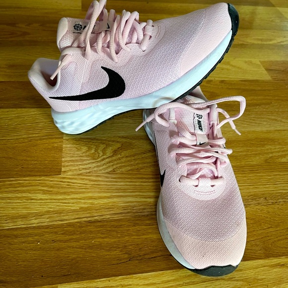 Nike Shoes - Nike running tennis shoes beautiful pretty pink with a black swish.
